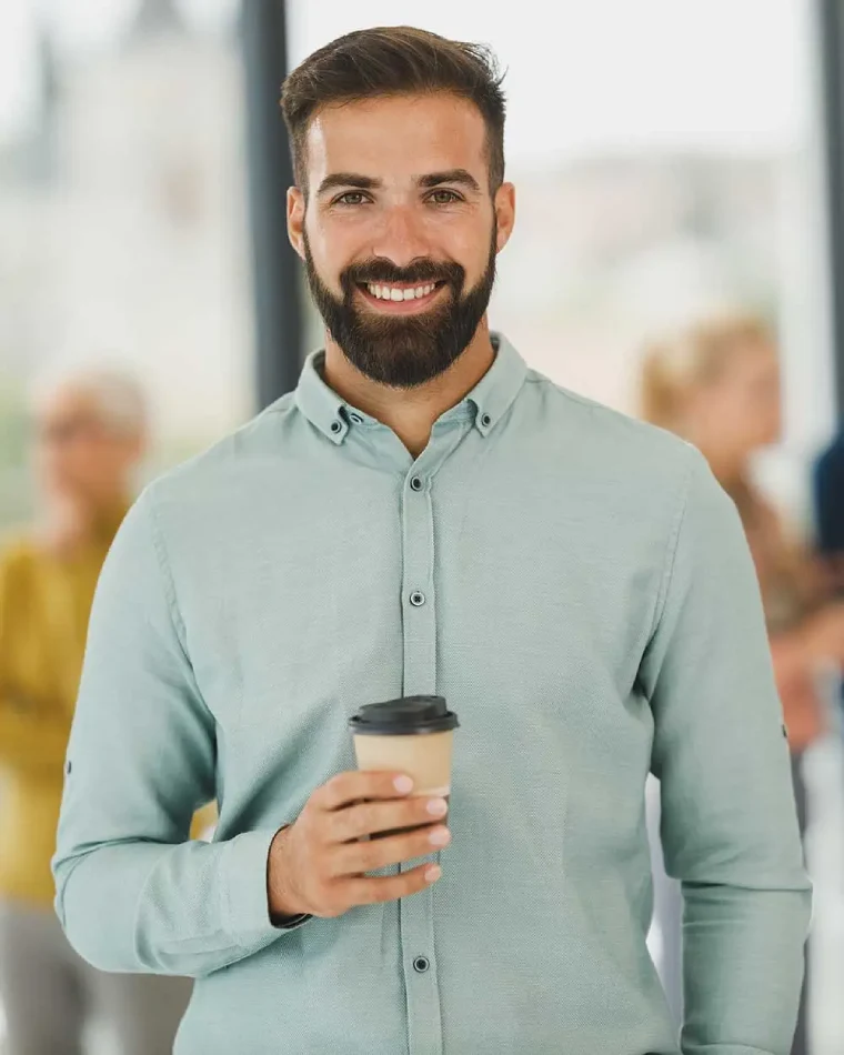 beard businessman hold coffee