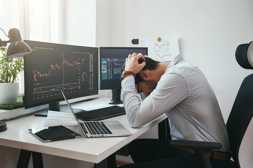 feeling sad depressed young businessman or trader