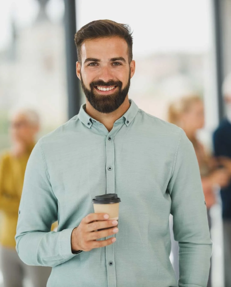 man with cup