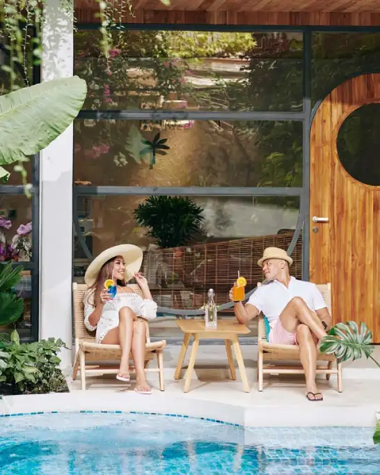 couple by swimming pool