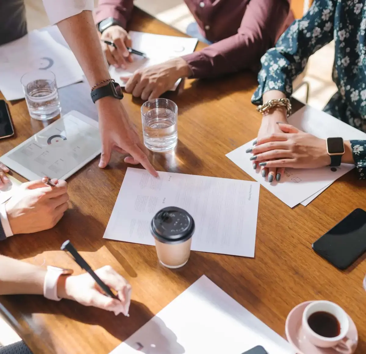 businesspeople brainstorming in a meeting
