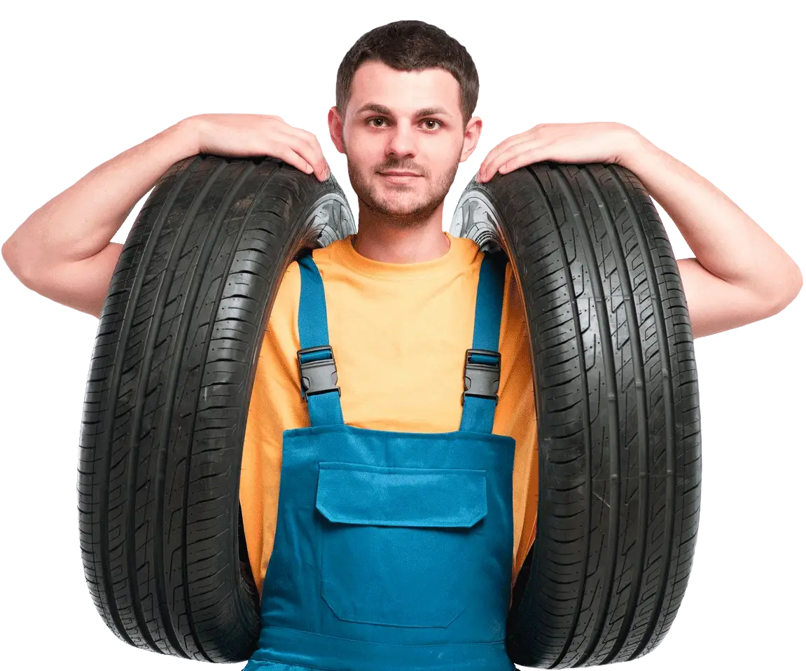 tire service worker in blue uniform