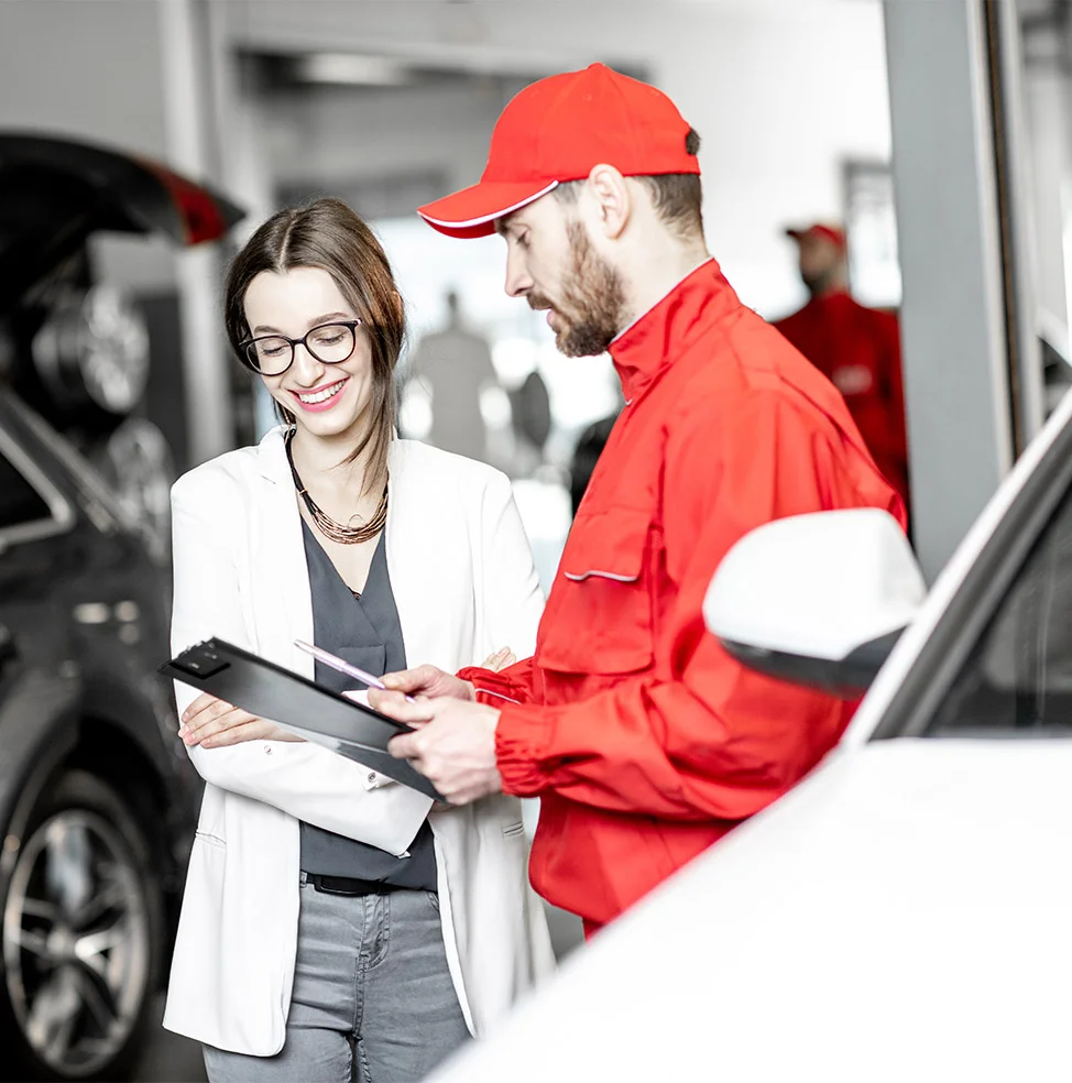 woman client with auto mechanic
