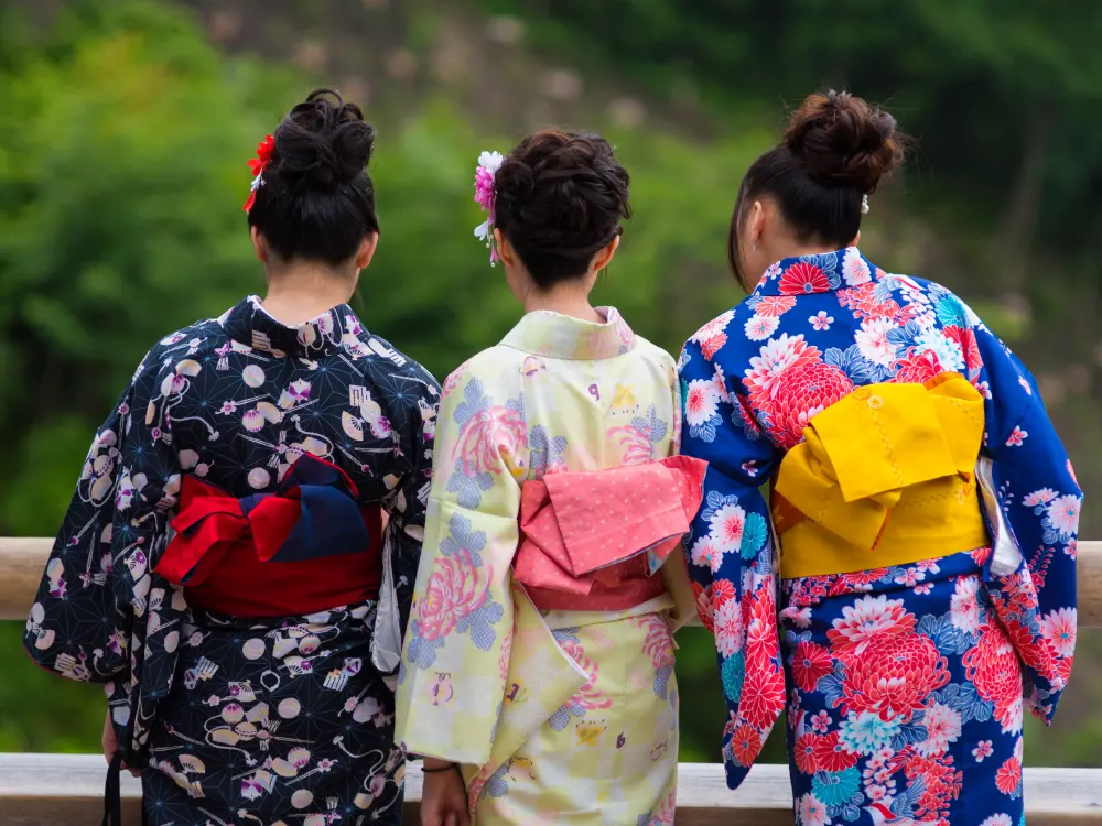Women tourism wear a traditional dress called Kimono