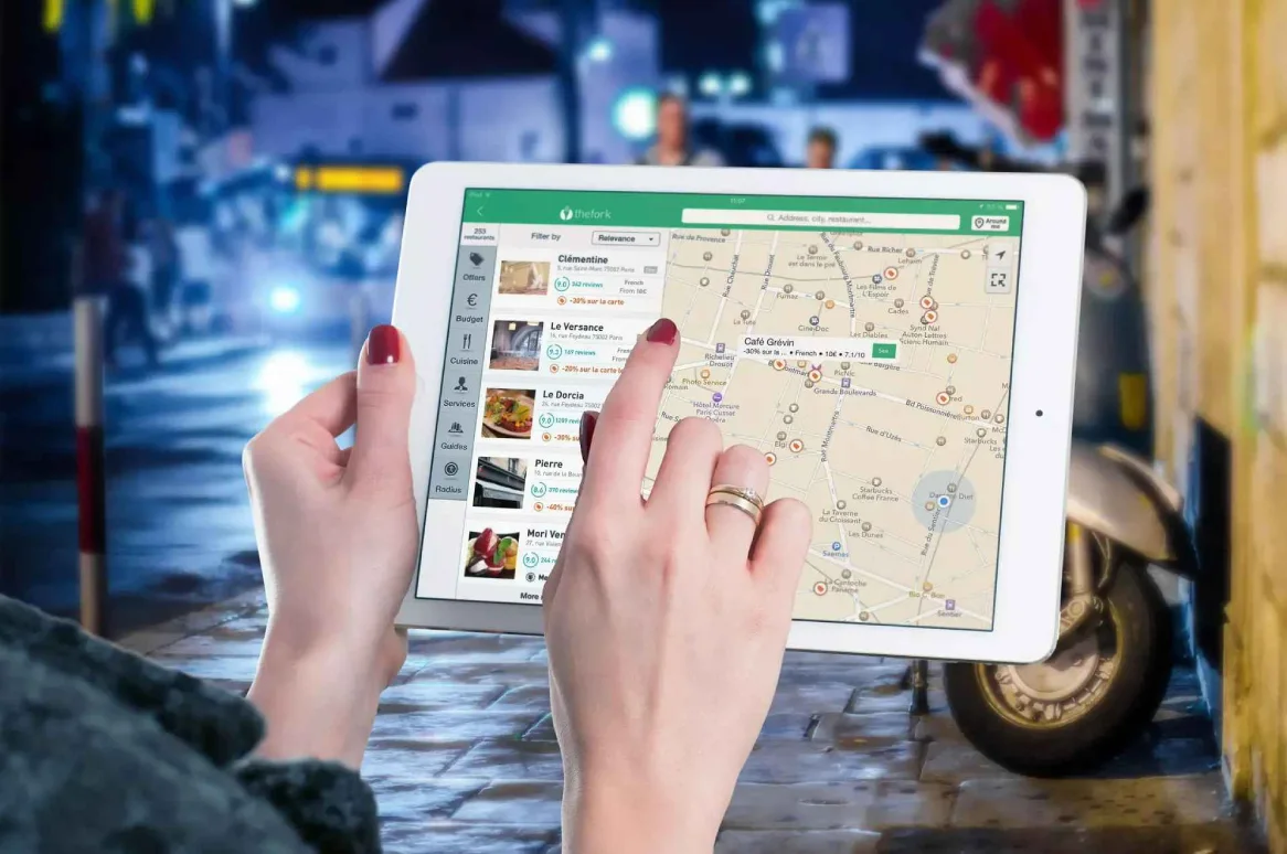mobile hand screen ipad find restaurant